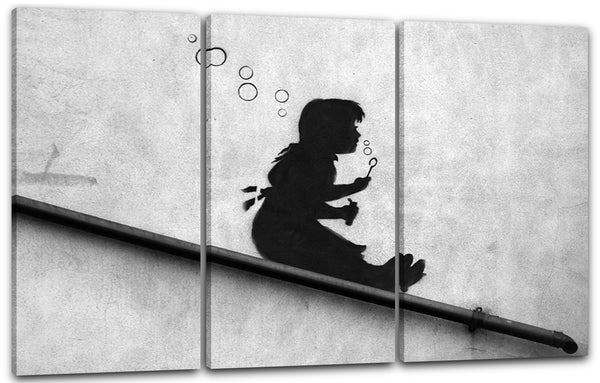 Leinwandbild Banksy - Mädchen Seifenblasen rutscht Gelände runter Wand-Graffiti cool stylisch