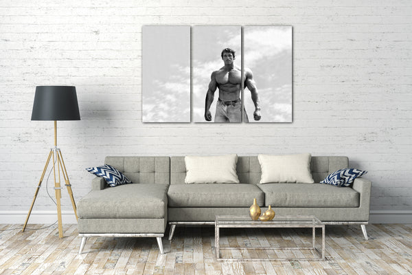 Leinwandbild Junger Arnold Schwarzenegger vor Himmel-Kulisse Oberkörper frei