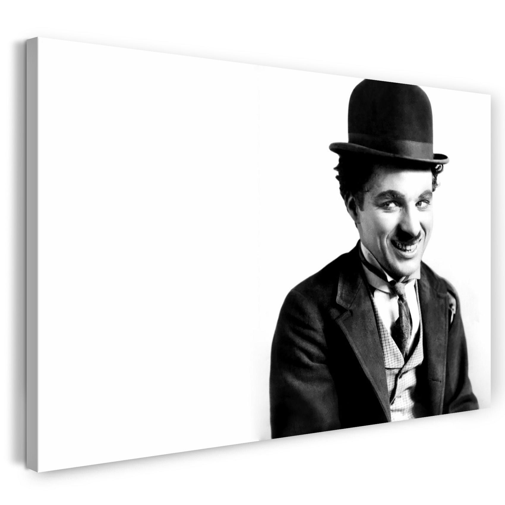 Leinwandbild Charlie Chaplin schelmisch lachend vor weißem Hintergrund
