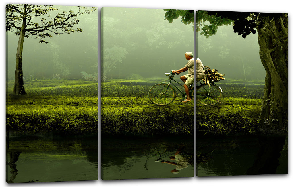 leinwandbild mountainbike Leinwandbild Mann mit Fahrrad in grünem Regenwald und Fluss mit Spiege – Printed Paintings