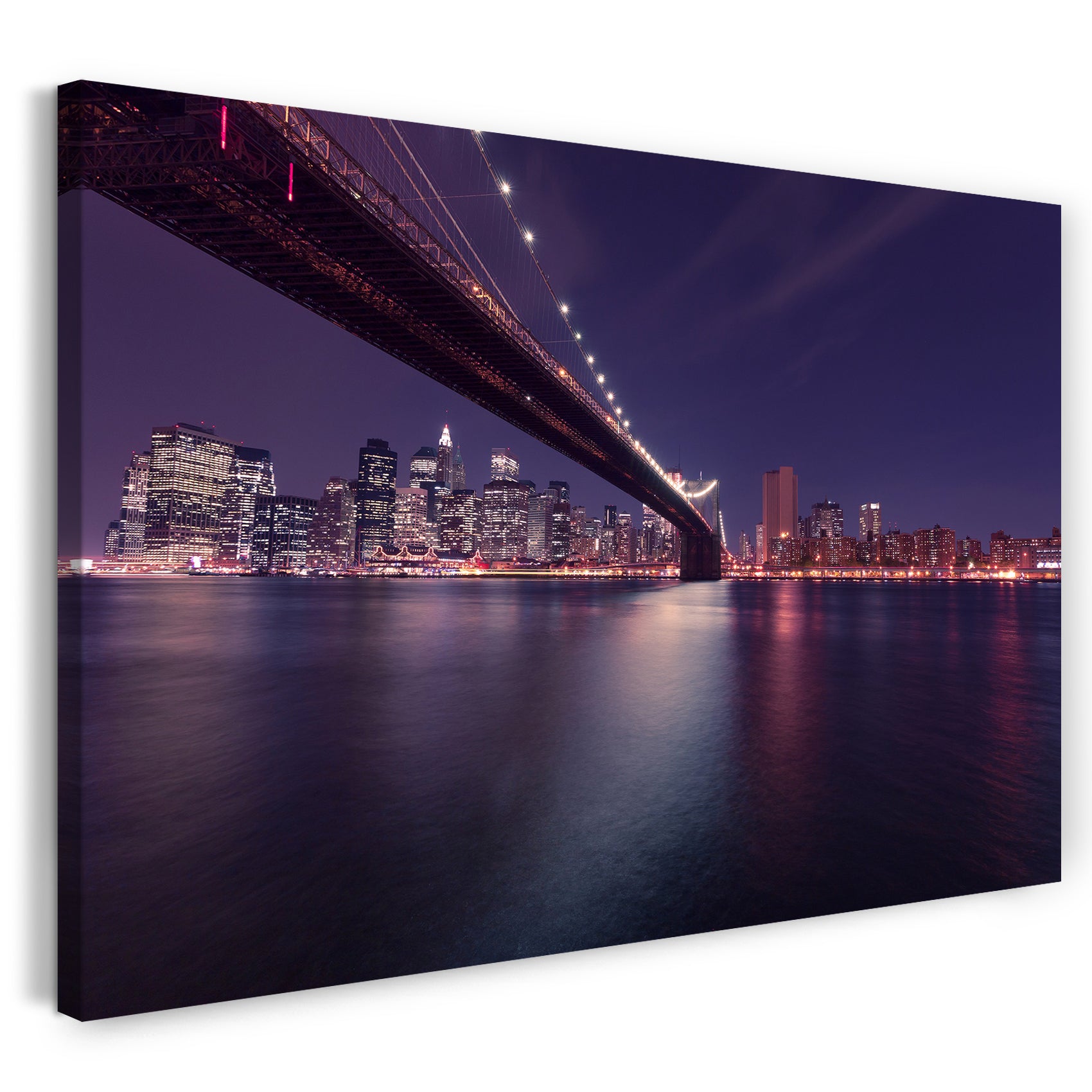 Leinwandbild Panorama Skyline bei Nacht am Meer mit Brücke mit Lichtern