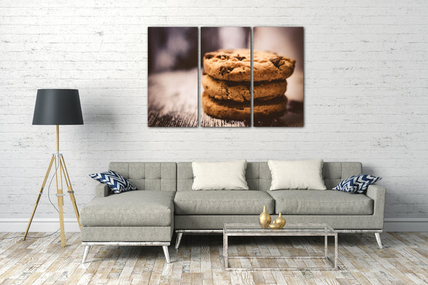 Leinwandbild Wandbild zur Küchendeko, drei Cookies aufeinander gestapelt