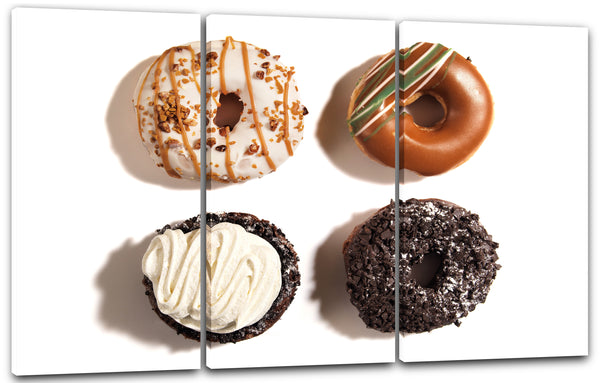 Leinwandbild Wandbild zur Küchendeko, vier Donuts mit unterschiedlichem Belag
