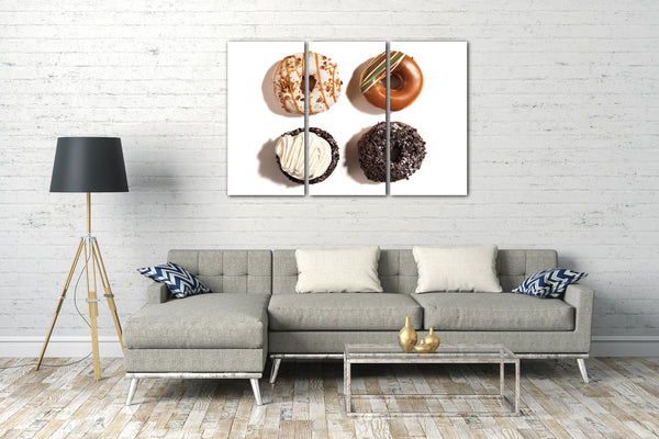 Leinwandbild Wandbild zur Küchendeko, vier Donuts mit unterschiedlichem Belag