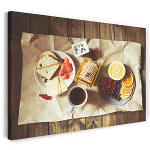 Leinwandbild Essensbilder Frühstück bunte Zusammenstellung auf hellem Holztisch