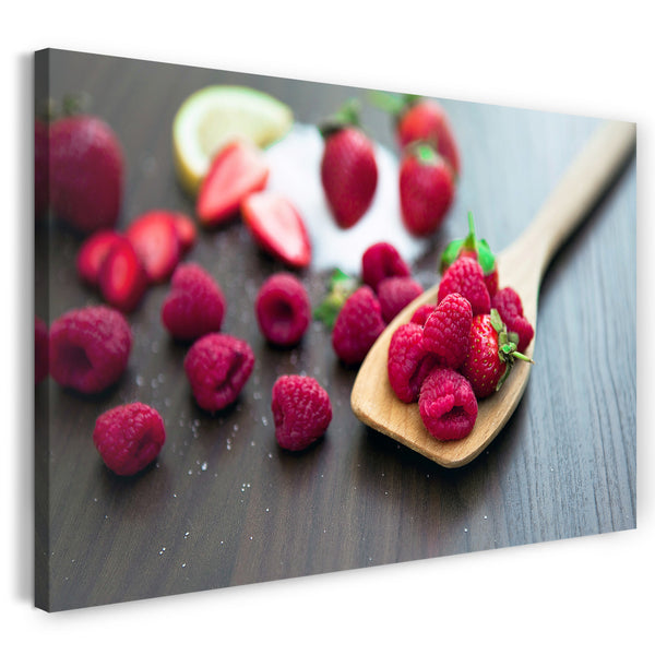 Leinwandbild Essensbilder Obst Früchte Himbeeren verteilt auf Holzlöffel und Tisch