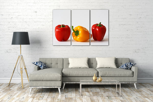 Leinwandbild Essensbilder Gemüse Obst rote und gelbe Paprika weißer Hintergrund