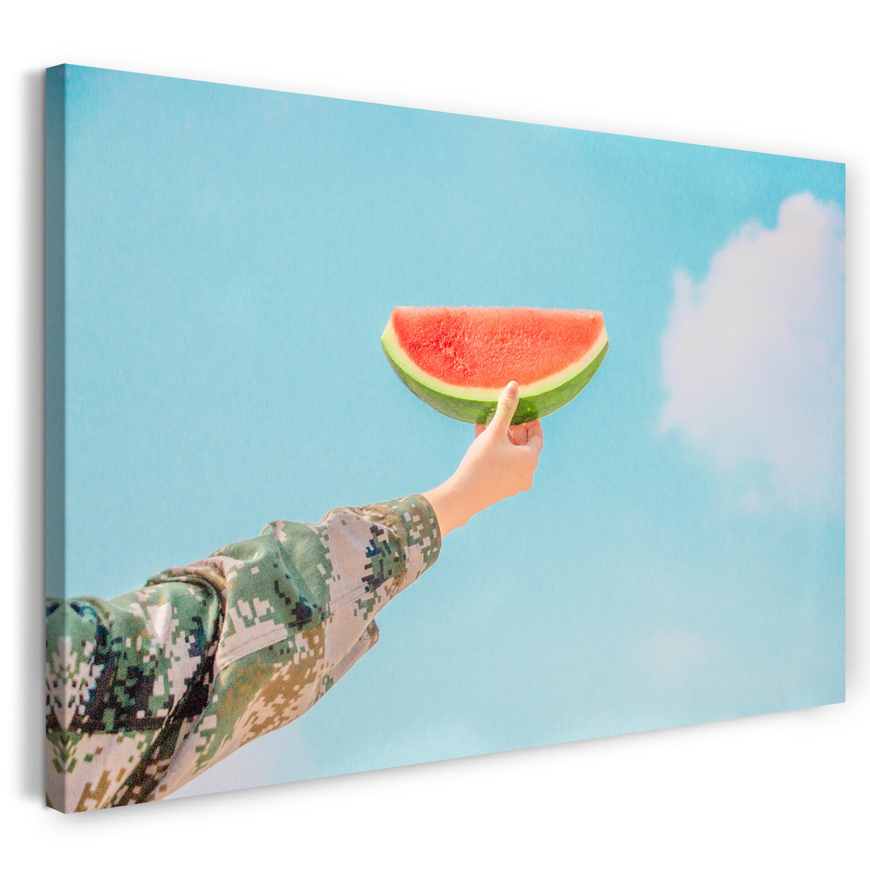 Leinwandbild Essensbilder Person hält Melone in den Himmel