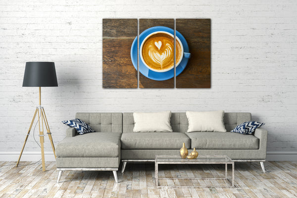Leinwandbild Wandbild Cappuccino Latte Art blaute Tasse auf Holztisch