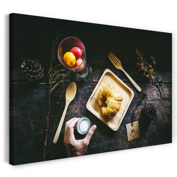 Leinwandbild Wanbild Küchendeko Croissant in Holzschüssel Holzbesteck Tannenzapfen