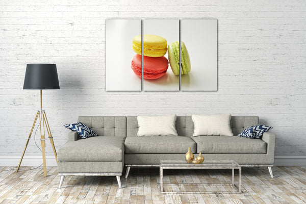 Leinwandbild Wandbild Küchendeko Macaron gelb rosa hell-grün weißer Hintergrund