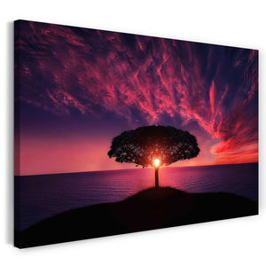 Leinwandbild Landschaftsbilder Baum im Meer vor wunderschönem Farbspiel am Himmel