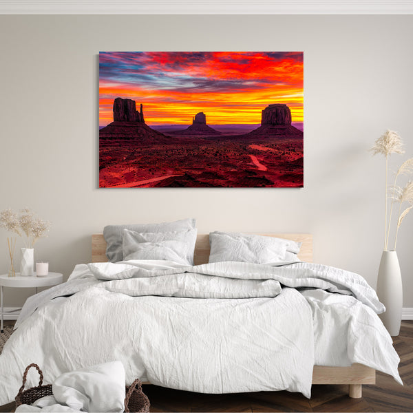 Leinwandbild Landschaftsbilder Rocky Mountains unter rot schimmerndem Himmel