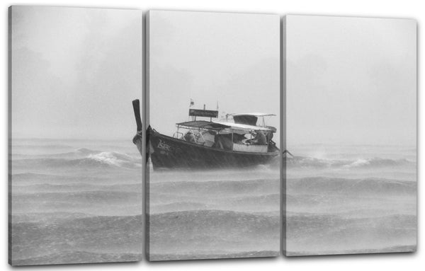 Leinwandbild Landschaftsbilder kleines Boot in heftiger Meeresströmung Gewitter