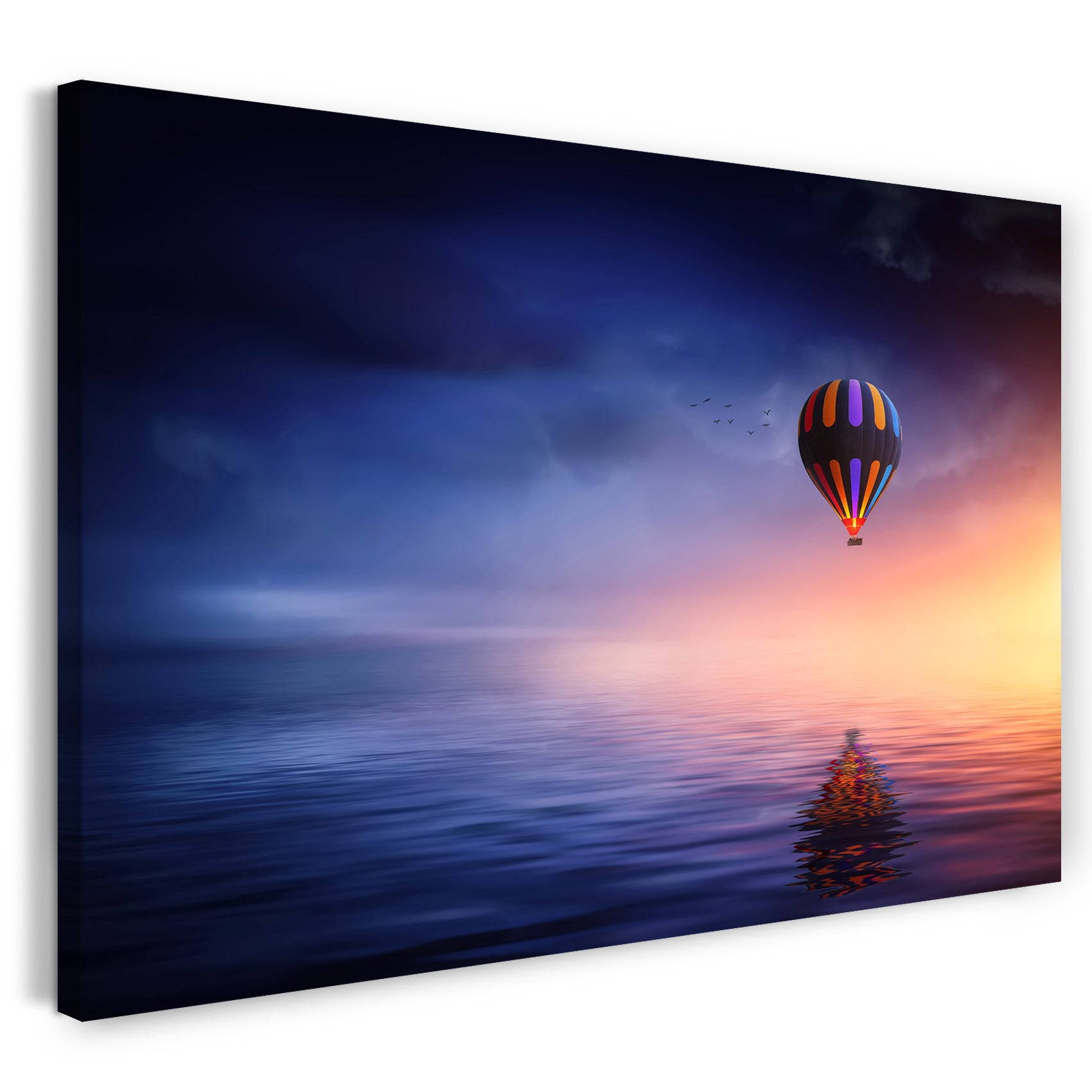 Leinwandbild Landschaftsbilder bunter Heißluftballon bei Sonnenuntergang