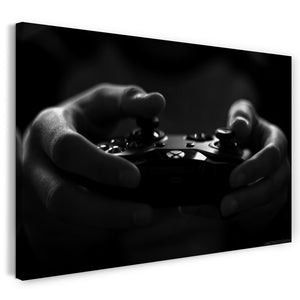Leinwandbild Gamer hält Game-Controller in Hand schwarz-weiß Foto Wand-Deko