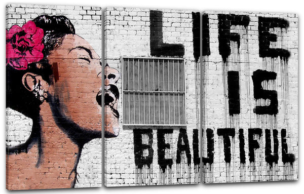 Leinwandbild Banksy - Life is beautiful Frau mit Rose im Haar mit Schriftzug