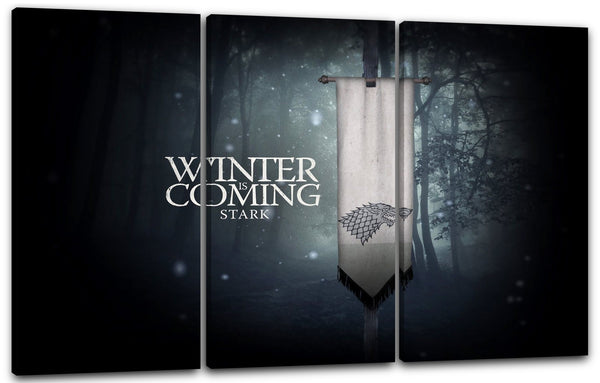 Leinwandbild Game of Thrones Winter is coming Wappen auf Fahne vor Wald