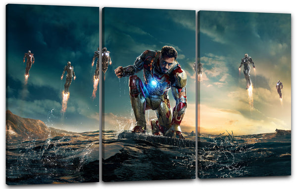 Leinwandbild Iron Man kniet Faust ballend im Meer Downey Jr